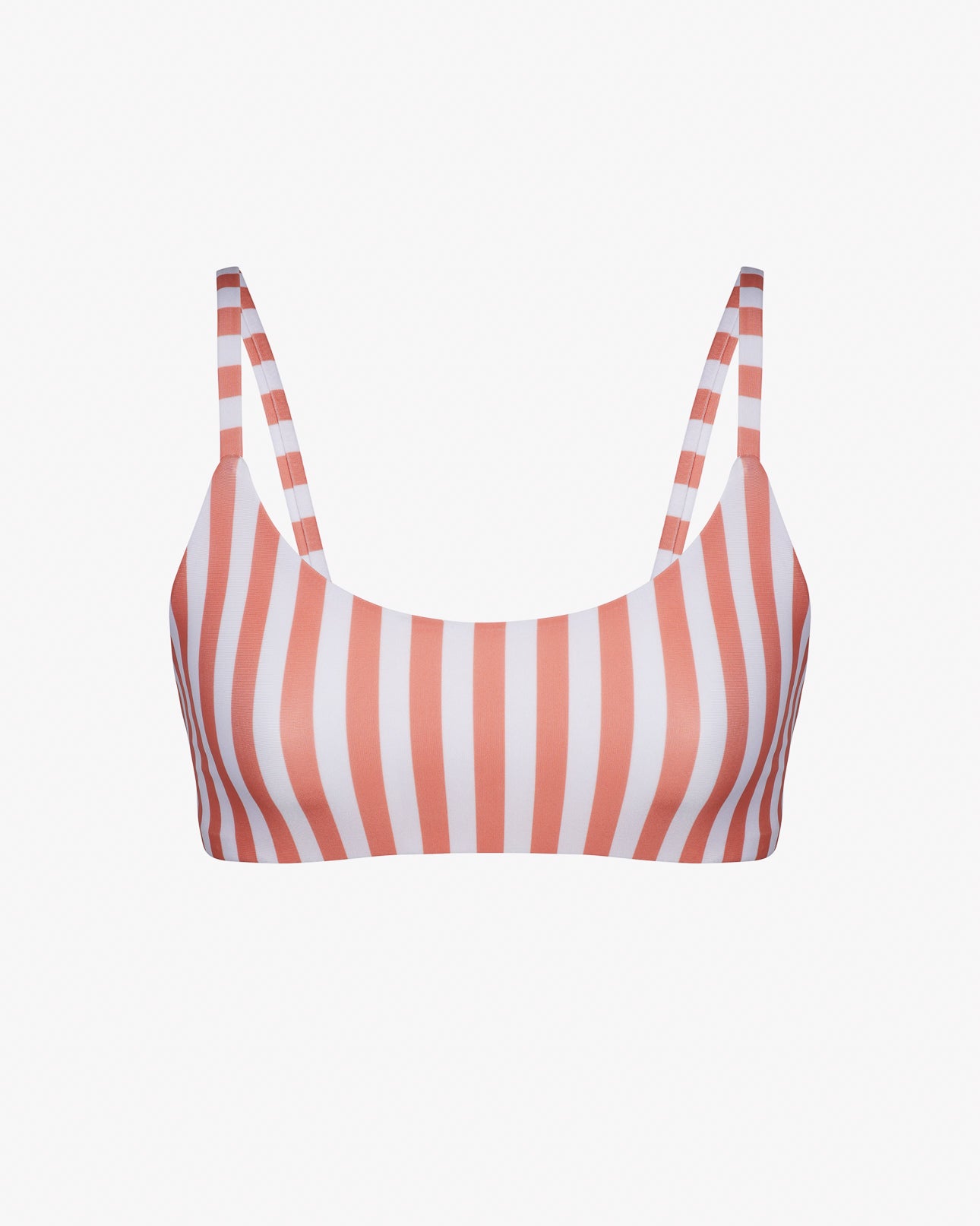 Das Sassy Bikini Oberteil von Main Design ist ein wendbares, gestreiftes Bikinioberteil mit dünnen Trägern aus chlorresistentem Stoff. Es besticht durch vertikale rosa und weiße Streifen, die Nachhaltigkeit und Stil vereinen, während seine Schlichtheit das klassische Streifenmuster unterstreicht.