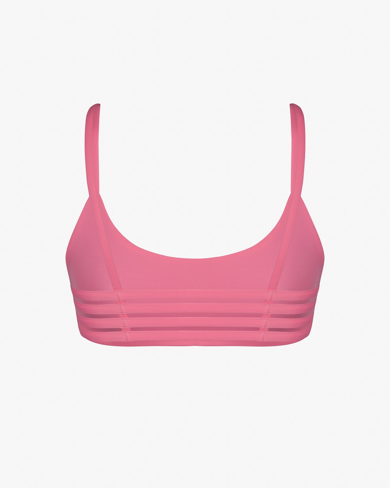 Das Sassy Bikini Oberteil reversibel von Main Design besticht durch dünne Träger, einen Rundhalsausschnitt und horizontale Banddetails. Hergestellt aus dehnbaren und chlorresistenten, nachhaltigen Materialien. Der schlichte weiße Hintergrund unterstreicht den Stil.