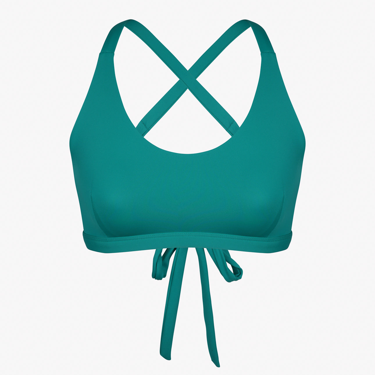 Das Charm Surf Bikini Oberteil von Main Design ist ein türkisfarbener Sport-BH mit gekreuzten Trägern und Bindeband vorne. Hergestellt aus chlorresistentem Material, ideal für Surf-Bikini-Sessions. Abgebildet auf weißem Hintergrund.