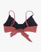 A red Adore Triangel Bikini Oberteil by Main Design with verstellbare Schulterträger and a black inner lining is displayed. The back view shows it tied with a large bow in the middle. The material appears to be smooth and stretchy.