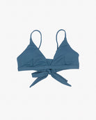 Dark teal bralette with verstellbare Schulterträger. The Main Design Adore Triangel Bikini Oberteil features a front tie with a bow, creating a wrapped appearance. Made from umweltfreundlicher Stoff, it appears smooth and slightly stretchy, suitable as Bikini Oberteil or for casual wear. Set against a plain white background.