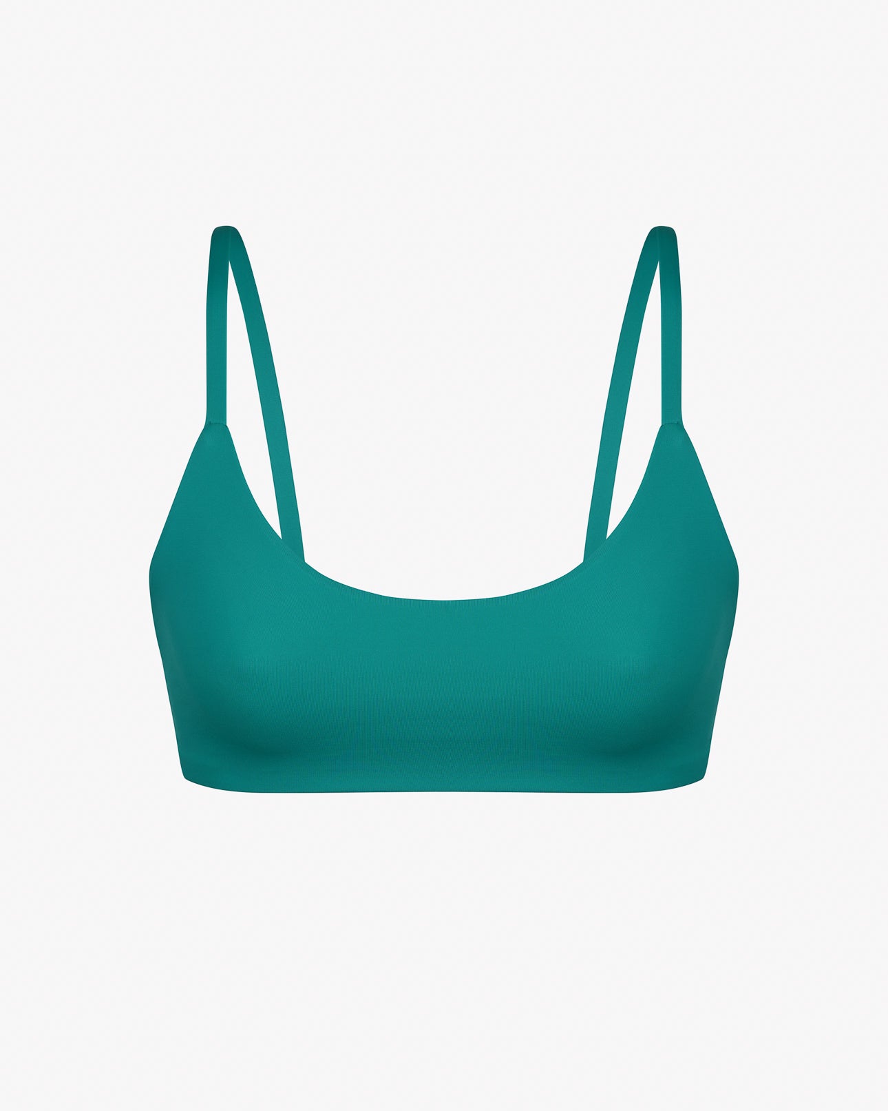 Das Sassy Bikini Oberteil Reversibel von Main Design ist ein blaugrünes Bralette-Oberteil mit dünnen Trägern und nahtloser Verarbeitung, gefertigt aus nachhaltigen Recyclingmaterialien, hier auf einem schlichten weißen Hintergrund abgebildet.