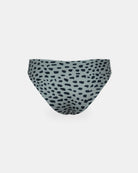 Rückansicht der Luxe Bikini Hose von Main Design mit abstraktem schwarz-weißem Tupfenmuster im brasilianischen Schnitt, hergestellt aus recycelten Materialien. Auf einfarbig weißem Hintergrund.