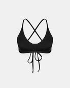 Das Drift Surf Bikini Oberteil von Main Design ist ein schwarzes Oberteil mit dünnen, überkreuzten Rückenträgern und Bindeverschluss auf der Vorderseite, hergestellt aus nachhaltigen Materialien, abgebildet auf einem schlichten weißen Hintergrund.