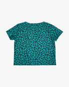 Das Lush UV Surf Shirt von Main Design ist ein türkisfarbenes, kurzärmeliges T-Shirt mit einem kräftigen schwarzen Leopardenmuster auf schlichtem weißem Hintergrund und bietet auf dem gesamten Stoff einen UPF 50+-Schutz.